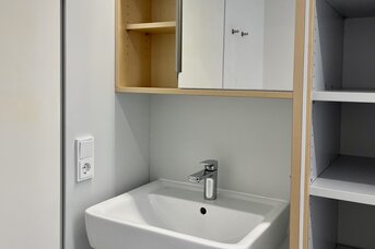 Bathroom niche of the small fully furnished room
